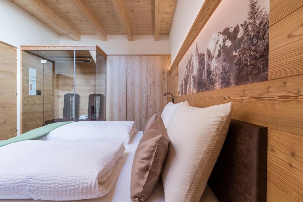 A bed or beds in a room at Les Pizades