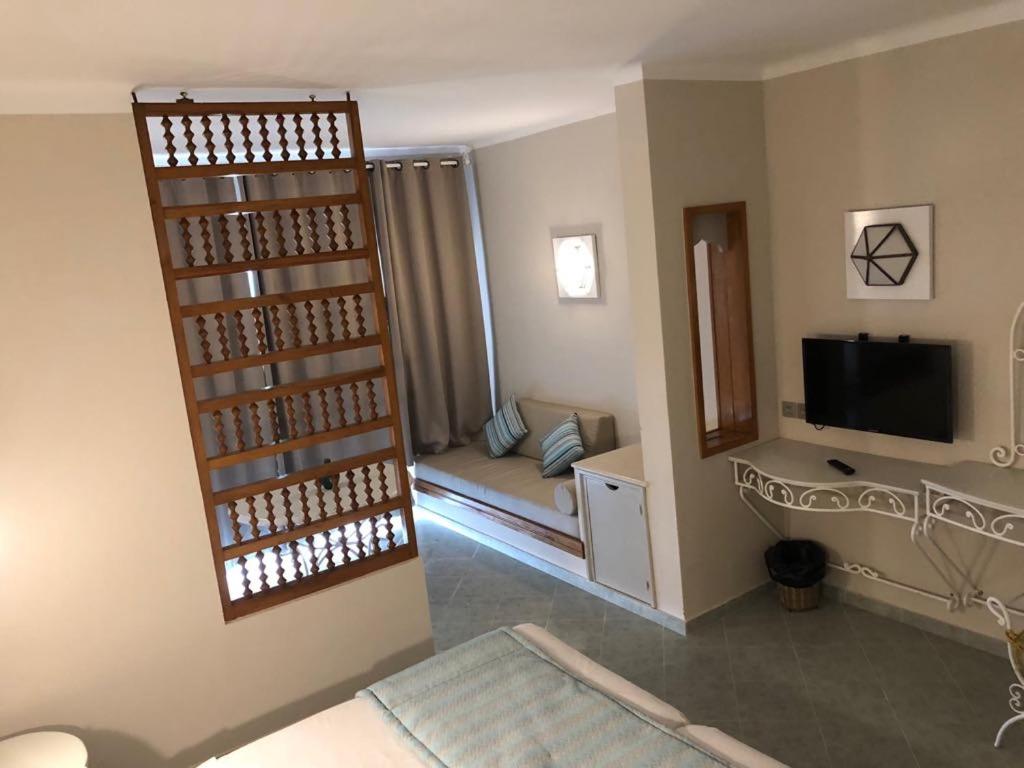 TV a/nebo společenská místnost v ubytování Hotel La Residence Hammamet
