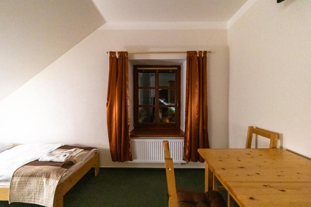 Postel nebo postele na pokoji v ubytování Penzion U řízků