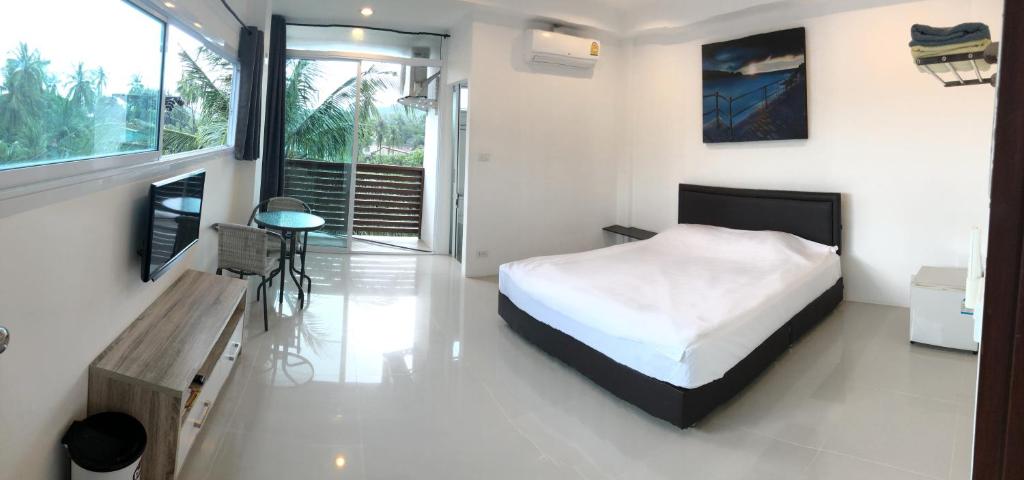 Postel nebo postele na pokoji v ubytování Sleep inn Samui