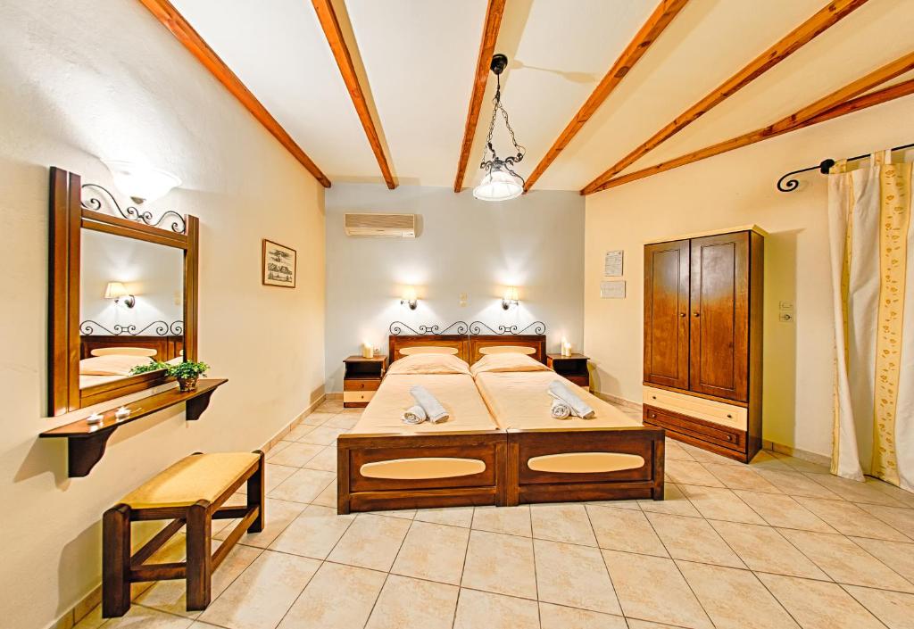 Postel nebo postele na pokoji v ubytování Harmony Hotel
