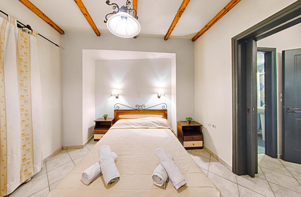 Postel nebo postele na pokoji v ubytování Harmony Hotel