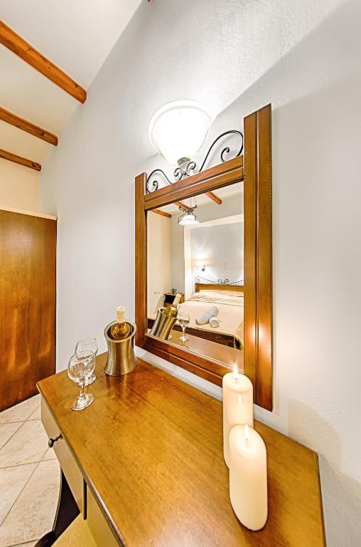 Postel nebo postele na pokoji v ubytování Harmony Hotel