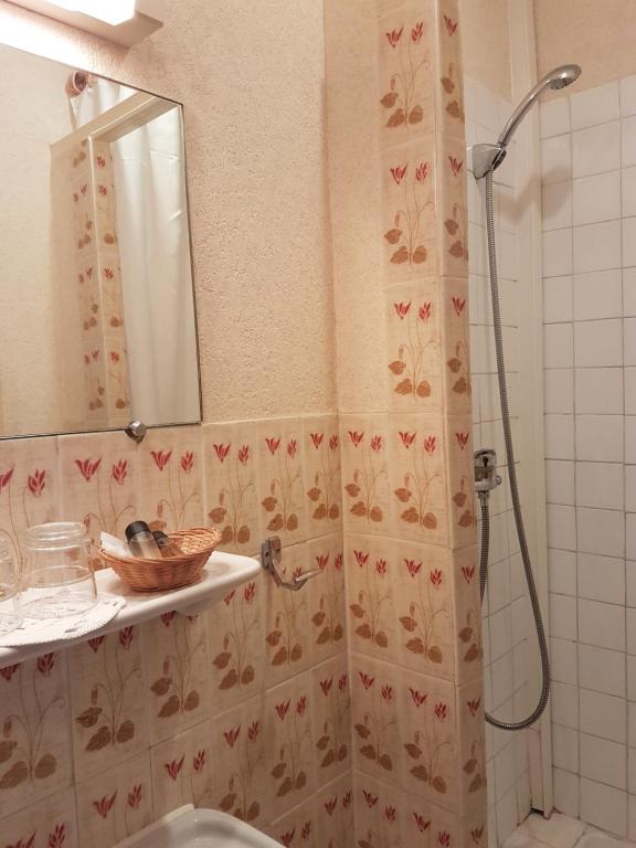Koupelna v ubytování Hotel Cronstadt