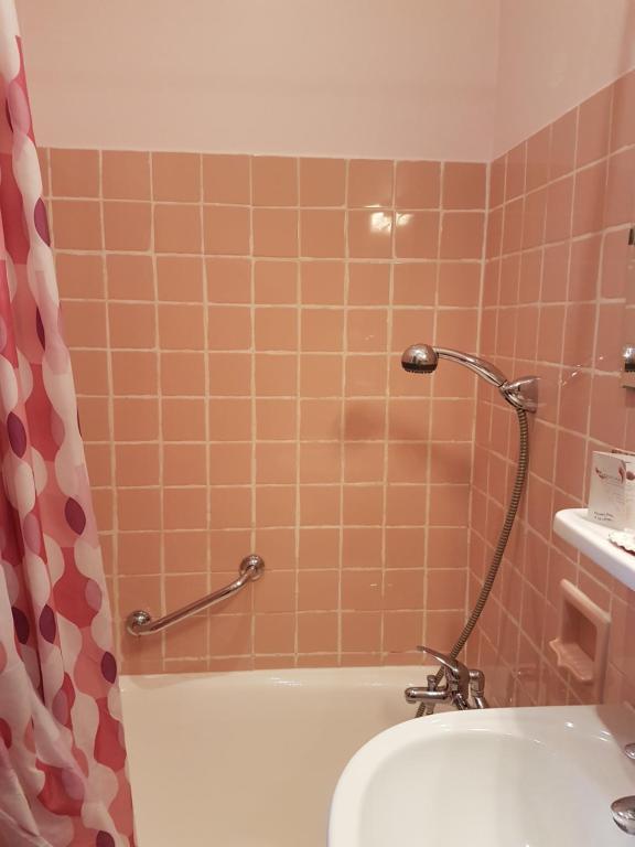 Koupelna v ubytování Hotel Cronstadt