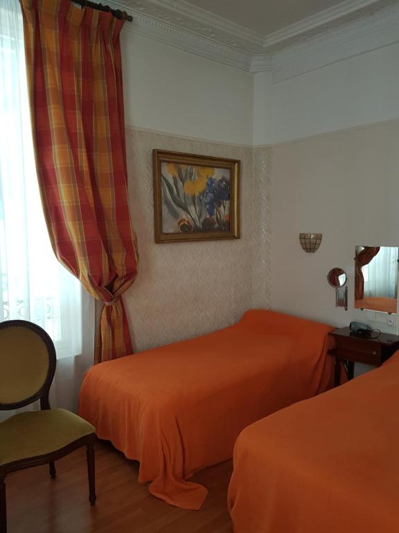 Postel nebo postele na pokoji v ubytování Hotel Cronstadt