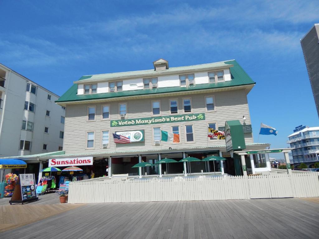 a large building on a street in a city at Shoreham Oceanfront Hotel in Ocean City