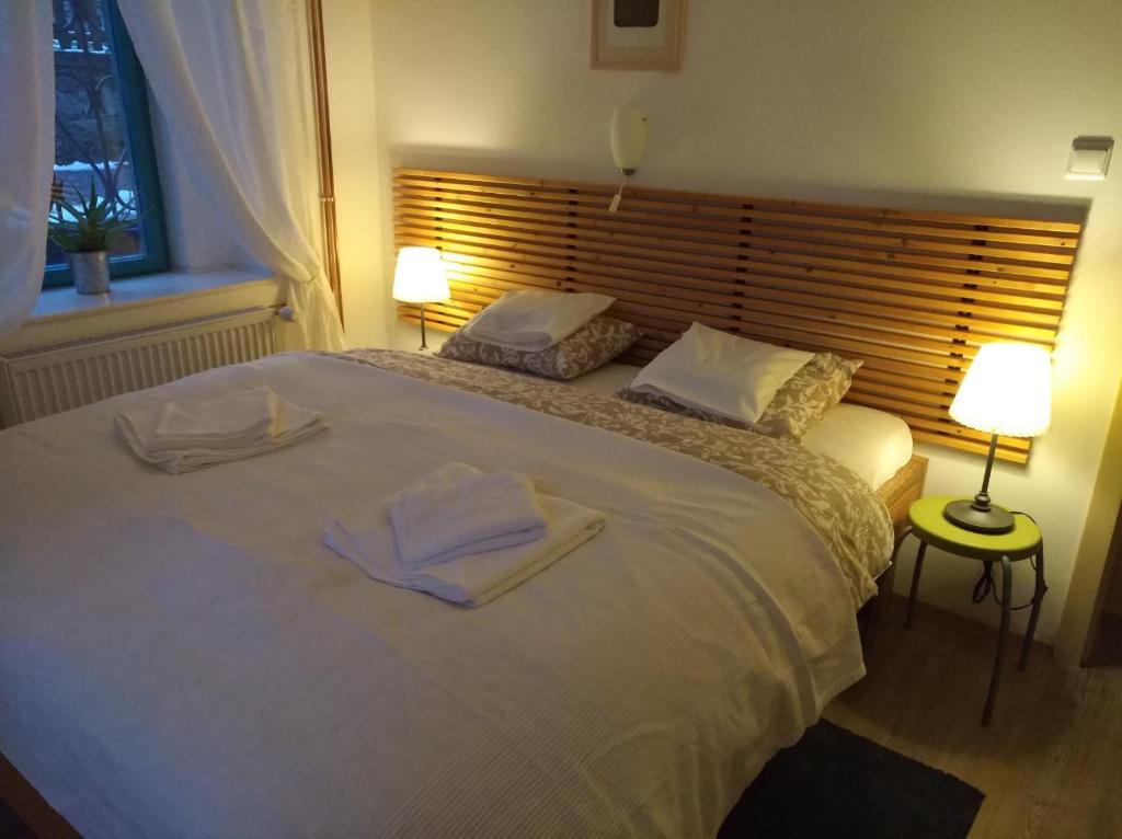 Postel nebo postele na pokoji v ubytování Apartmány Ruprechtov