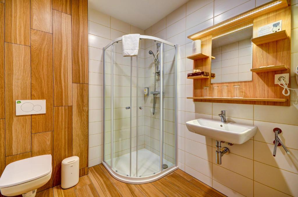 Koupelna v ubytování Hotel Helios