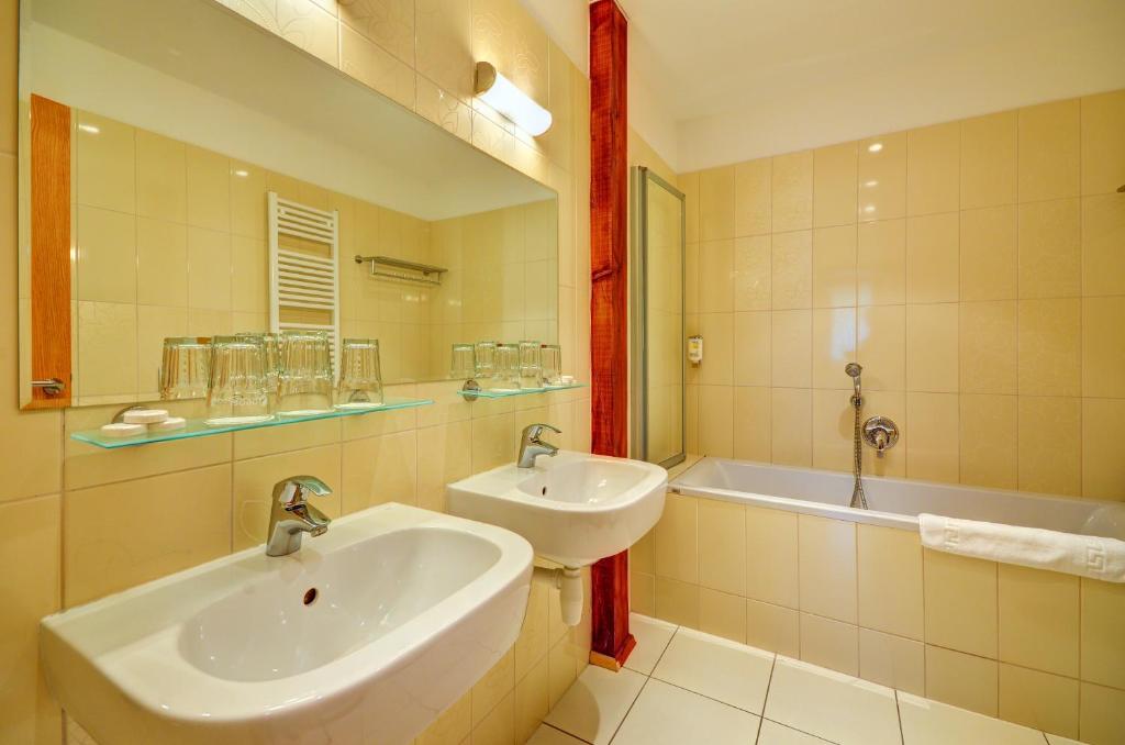 Koupelna v ubytování Hotel Helios
