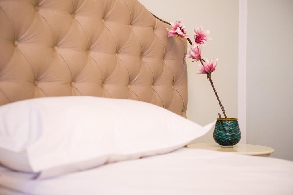 Un pat sau paturi într-o cameră la Saphyr Residences - CLASSICAL URBAN SUITE