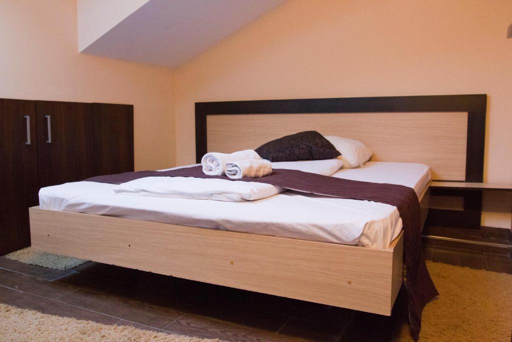 Postel nebo postele na pokoji v ubytování Vila Senjak