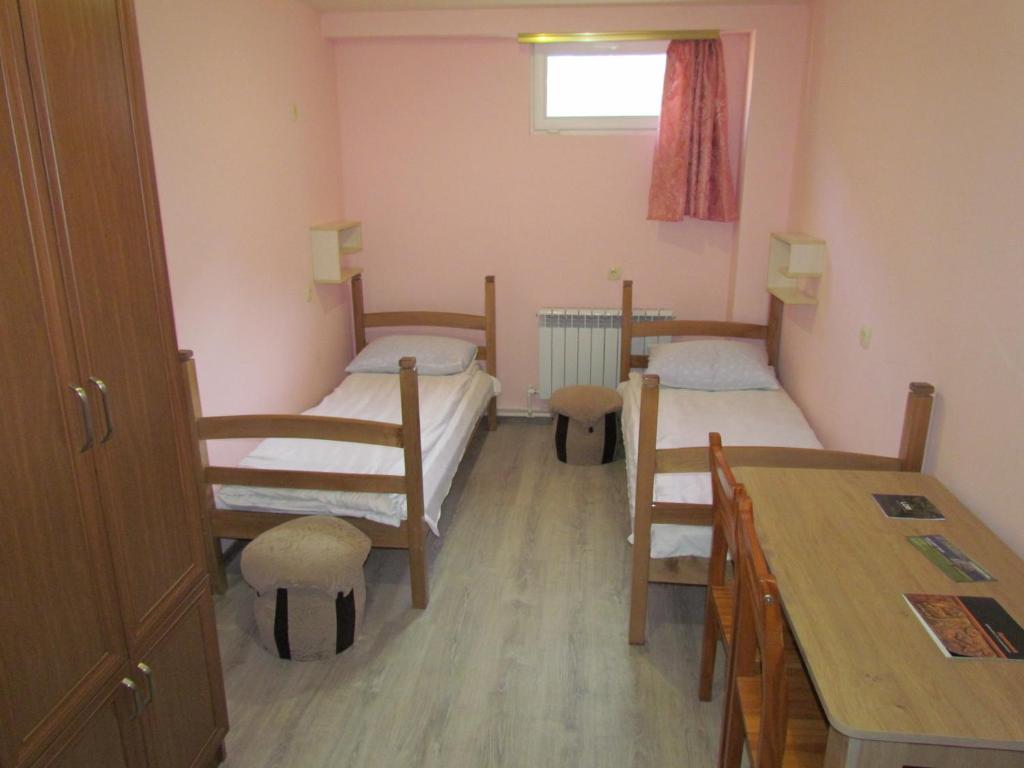 Postel nebo postele na pokoji v ubytování Arsego Hostel