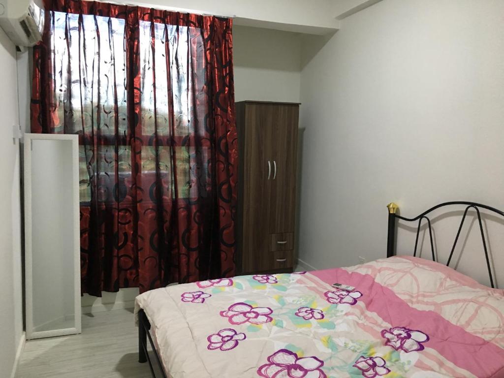 Postel nebo postele na pokoji v ubytování OHANA Sky Villa Residences