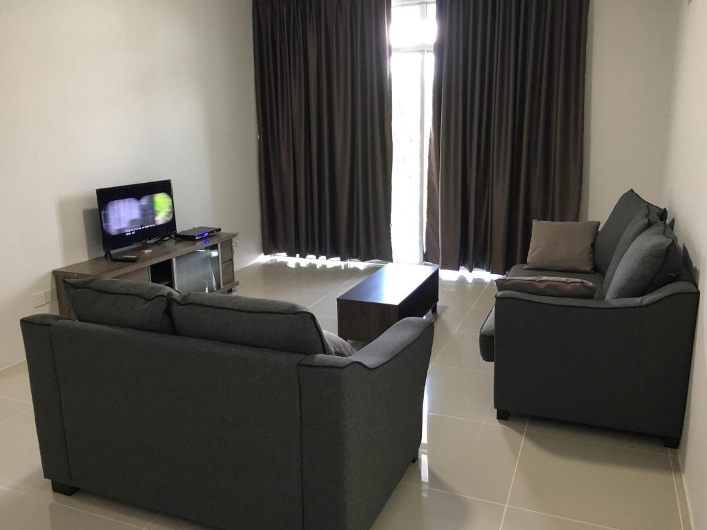TV a/nebo společenská místnost v ubytování OHANA Sky Villa Residences