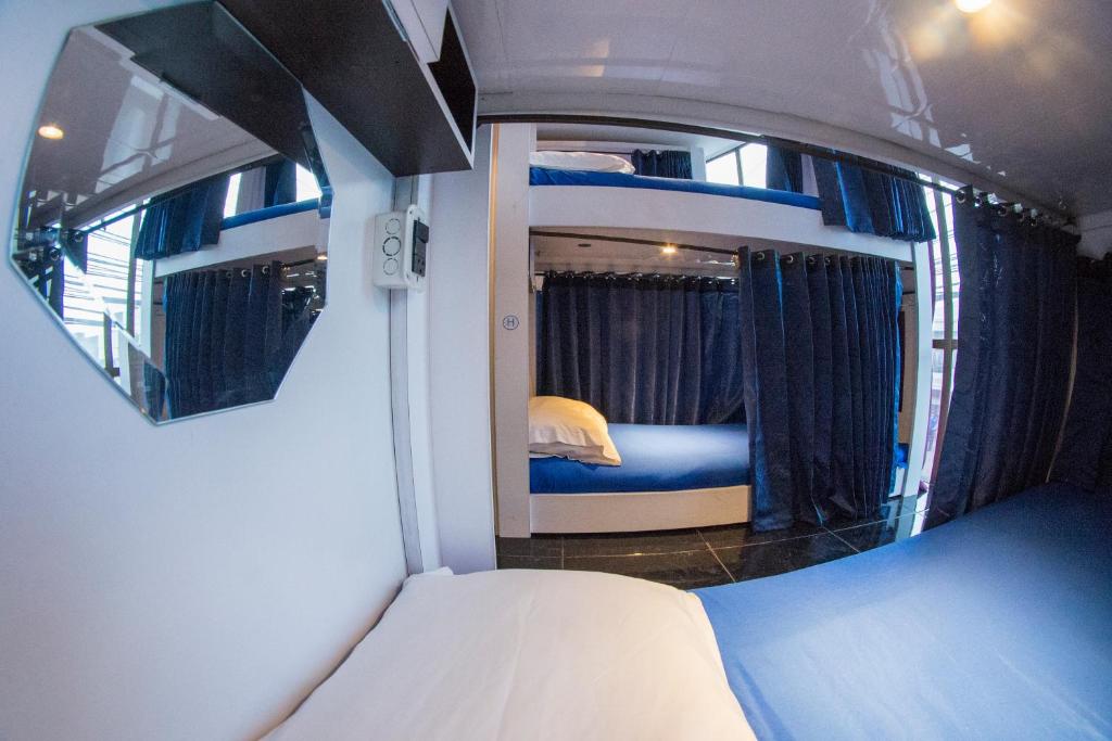 Postel nebo postele na pokoji v ubytování Mandala Yoga Hostel