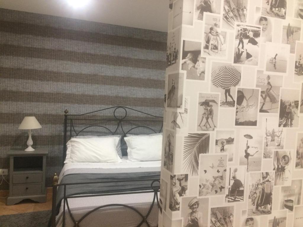 Łóżko lub łóżka w pokoju w obiekcie Etna Holidays Home SereLeo