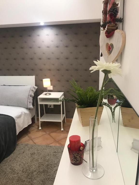 Łóżko lub łóżka w pokoju w obiekcie Etna Holidays Home SereLeo
