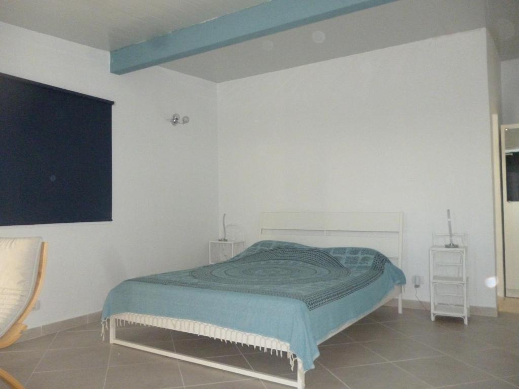 Postel nebo postele na pokoji v ubytování Roca Mar Tenerife