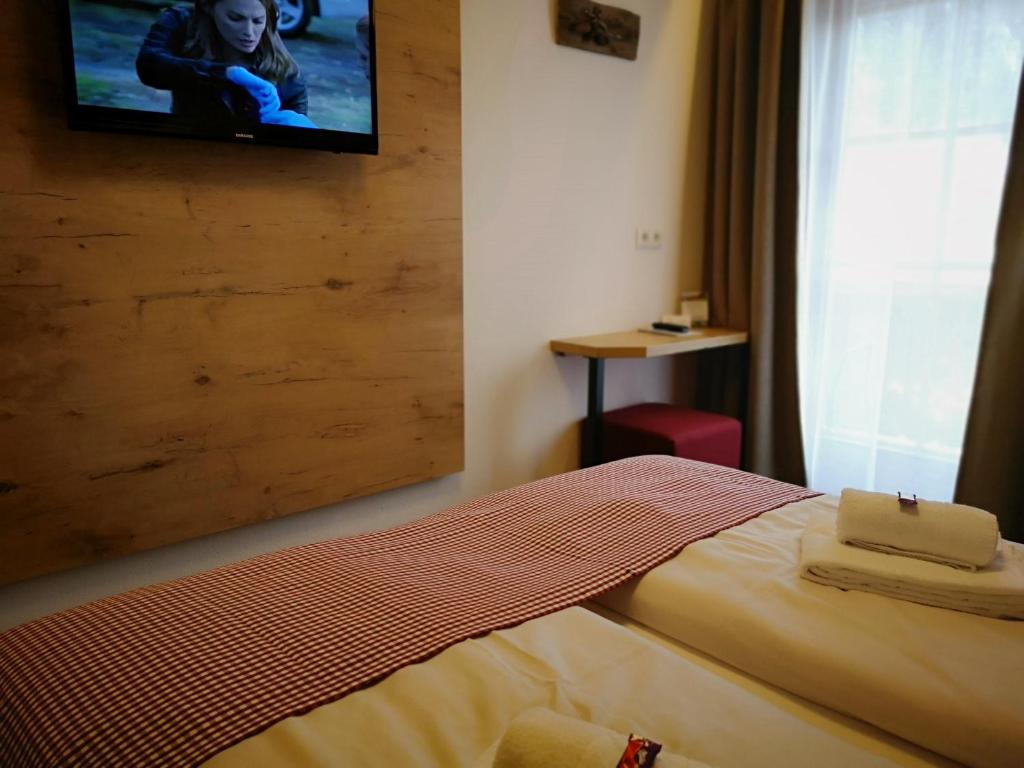 Posteľ alebo postele v izbe v ubytovaní Hotel Aschauer Hof z'Fritzn