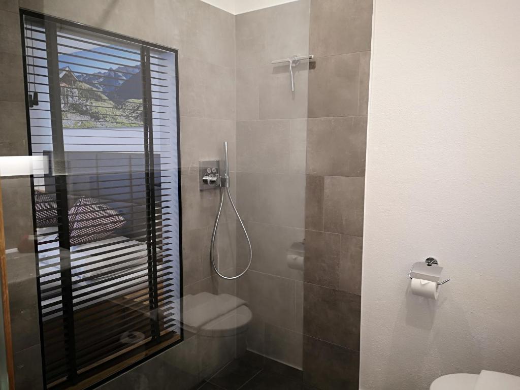 Kúpeľňa v ubytovaní Hotel Aschauer Hof z'Fritzn