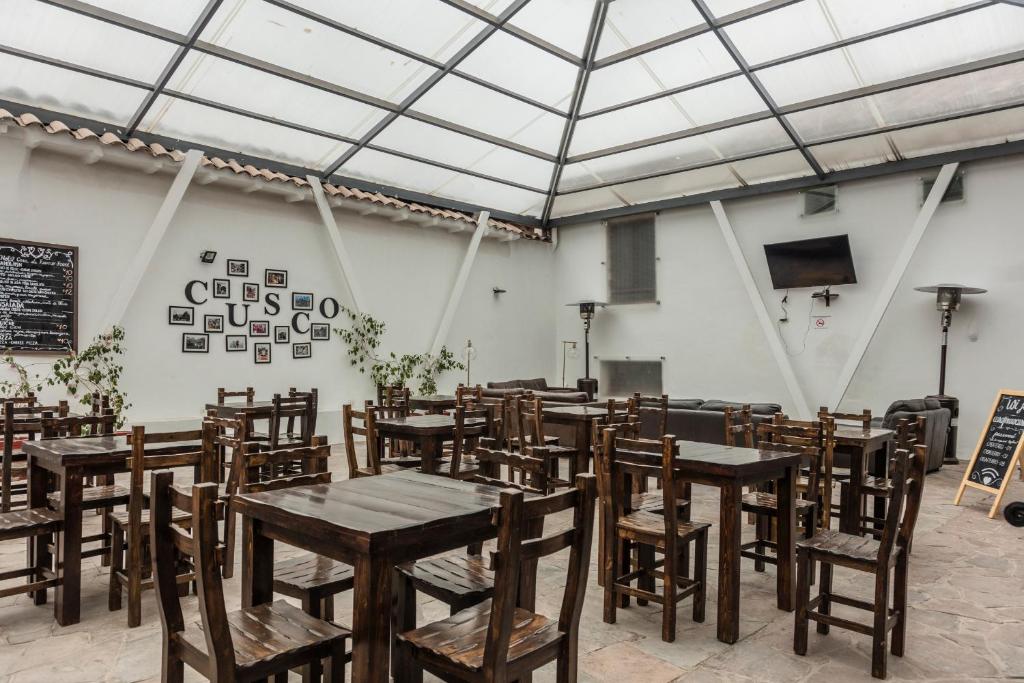 TV a/nebo společenská místnost v ubytování Hotel Casa Fierro Cusco