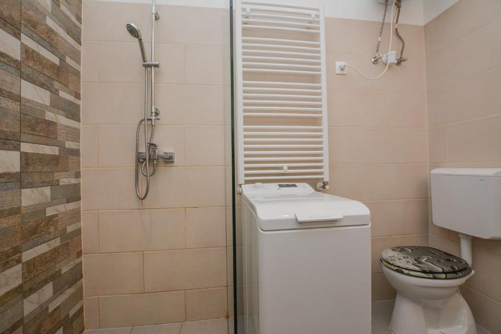 Kúpeľňa v ubytovaní Timeless Apartment with FREE Private PARKING