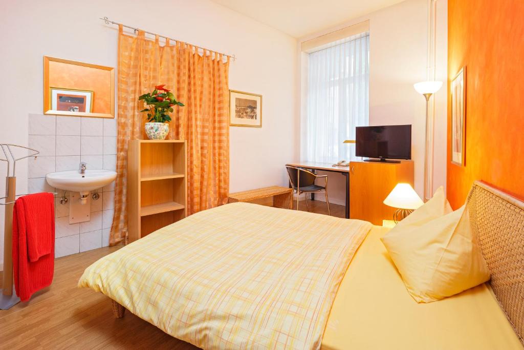 Postel nebo postele na pokoji v ubytování Residence zur Musegg