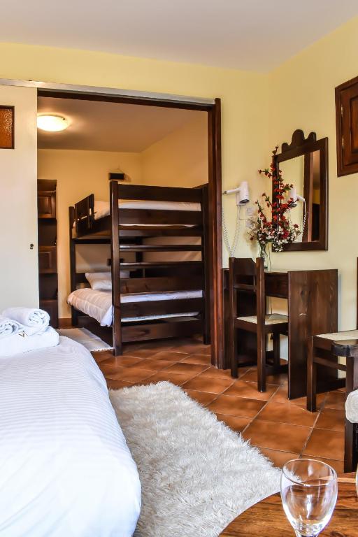 Postel nebo postele na pokoji v ubytování Dio Studios