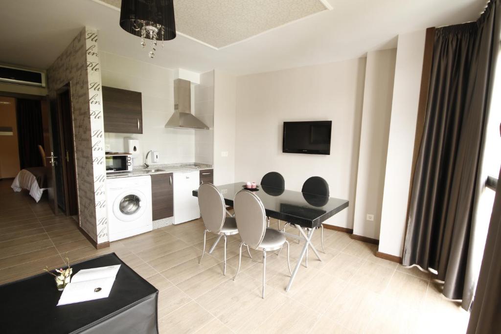 Kuchyň nebo kuchyňský kout v ubytování Alvear Suites