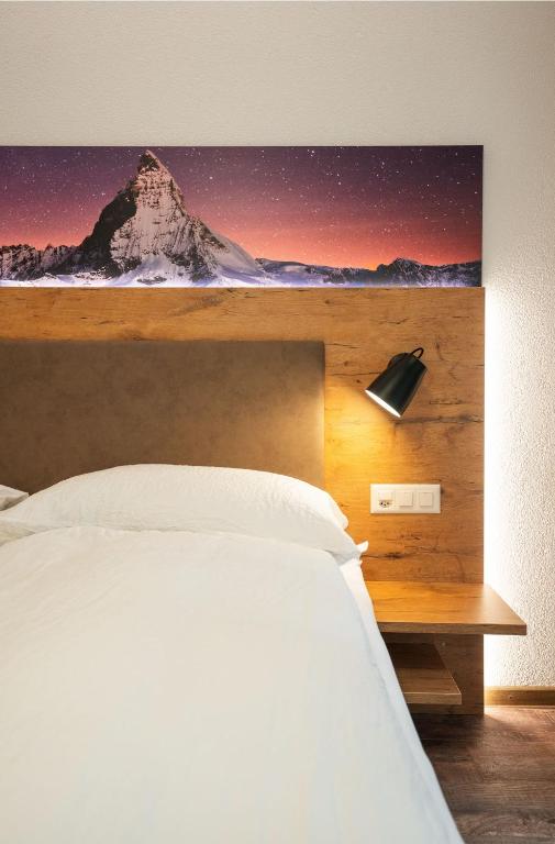 Postel nebo postele na pokoji v ubytování Apartments Patricia