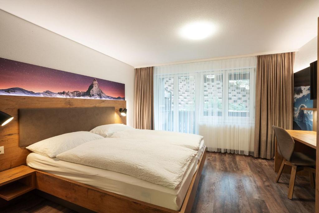 Postel nebo postele na pokoji v ubytování Apartments Patricia