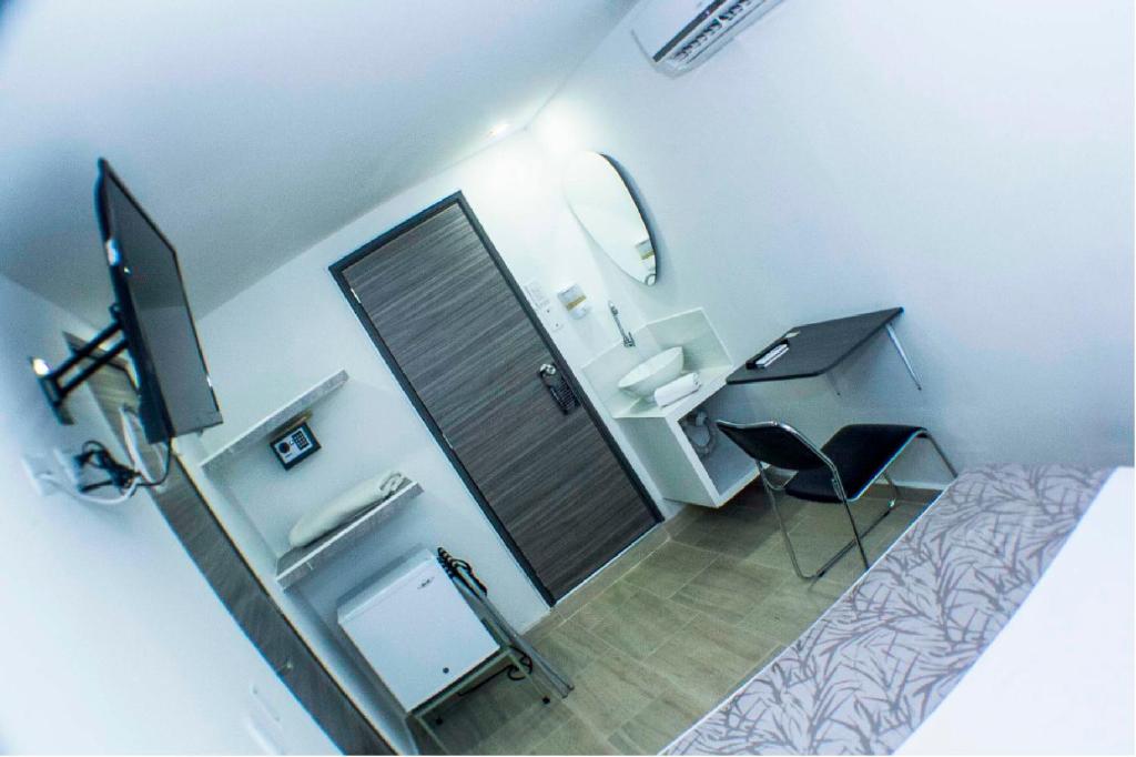 TV a/nebo společenská místnost v ubytování Element Hotel