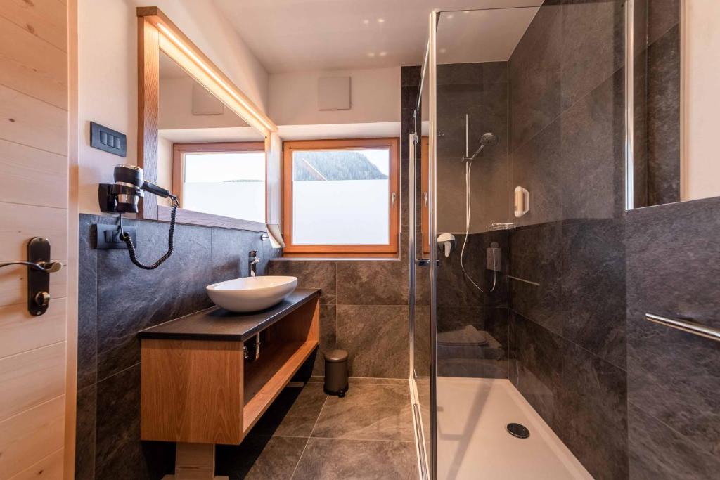 Koupelna v ubytování Garni Hotel Residence Diamant