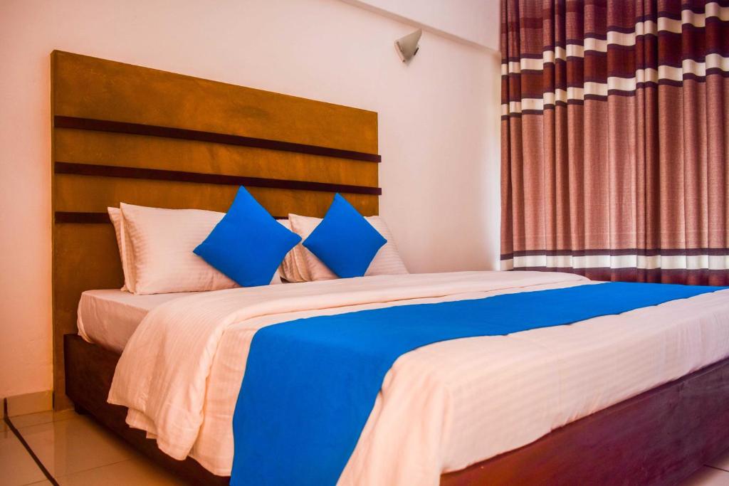 Postel nebo postele na pokoji v ubytování 360 Beach Residence