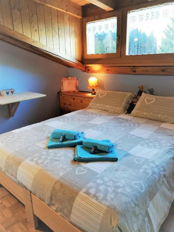 Postel nebo postele na pokoji v ubytování B&B La Genzianella