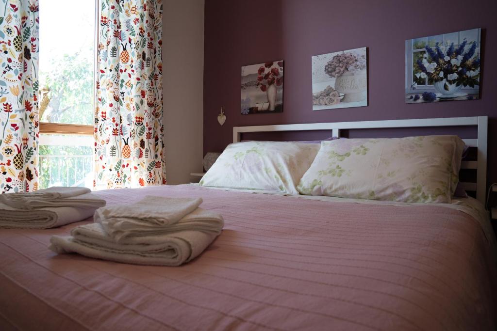 Postel nebo postele na pokoji v ubytování B&B Villa Noemi