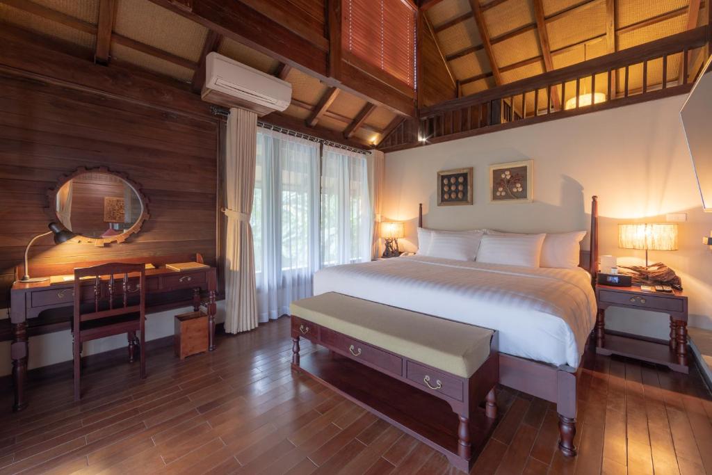Postel nebo postele na pokoji v ubytování Melia Ba Vi Mountain Retreat