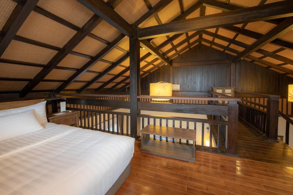 Postel nebo postele na pokoji v ubytování Melia Ba Vi Mountain Retreat