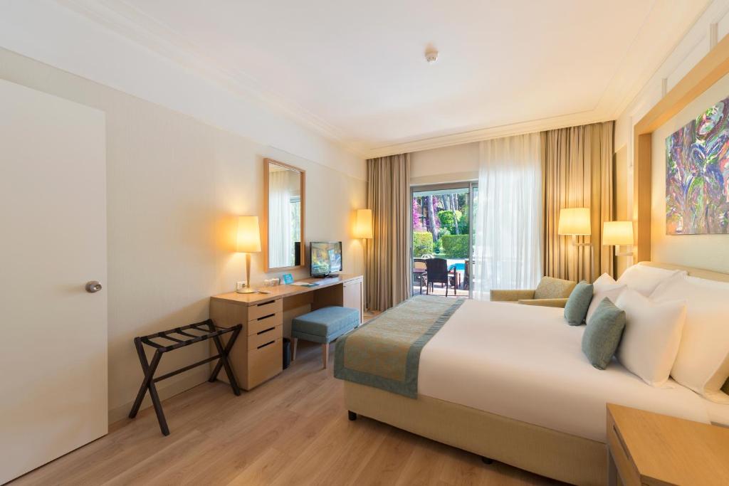 Postel nebo postele na pokoji v ubytování Turquoise Hotel
