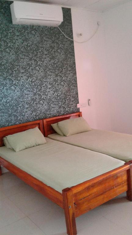 Postel nebo postele na pokoji v ubytování Masha Beach Inn