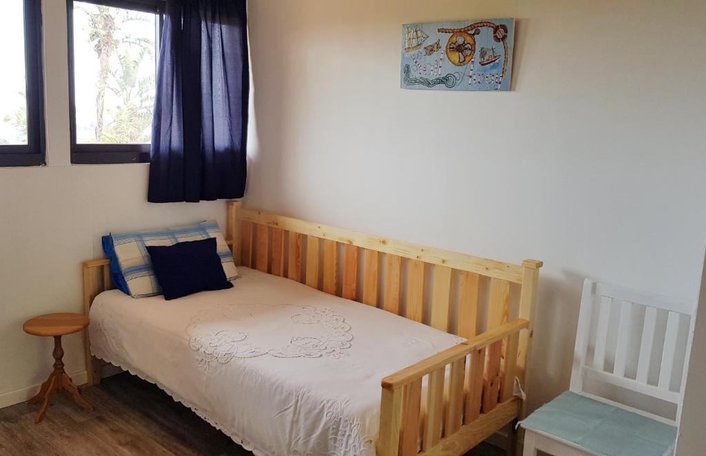 Postel nebo postele na pokoji v ubytování Hoylake Inn