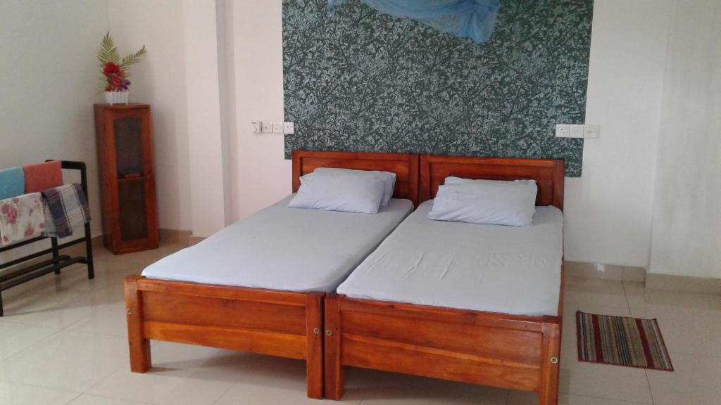 Postel nebo postele na pokoji v ubytování Masha Beach Inn