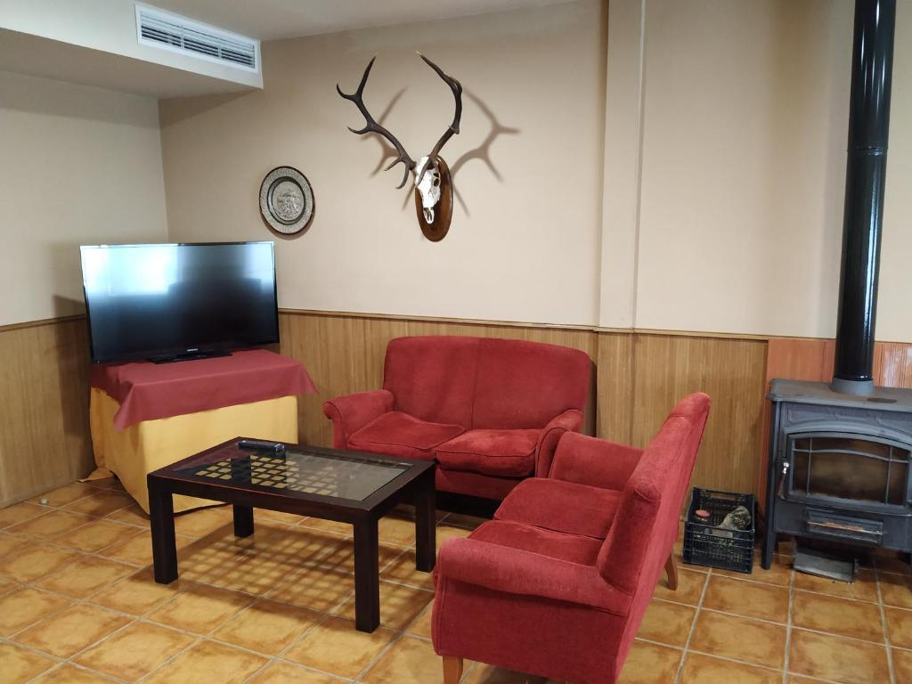 Telewizja i/lub zestaw kina domowego w obiekcie Hotel Sierra de Andujar