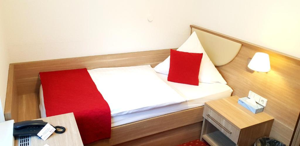 Postel nebo postele na pokoji v ubytování Aparthotel Wangener Landhaus
