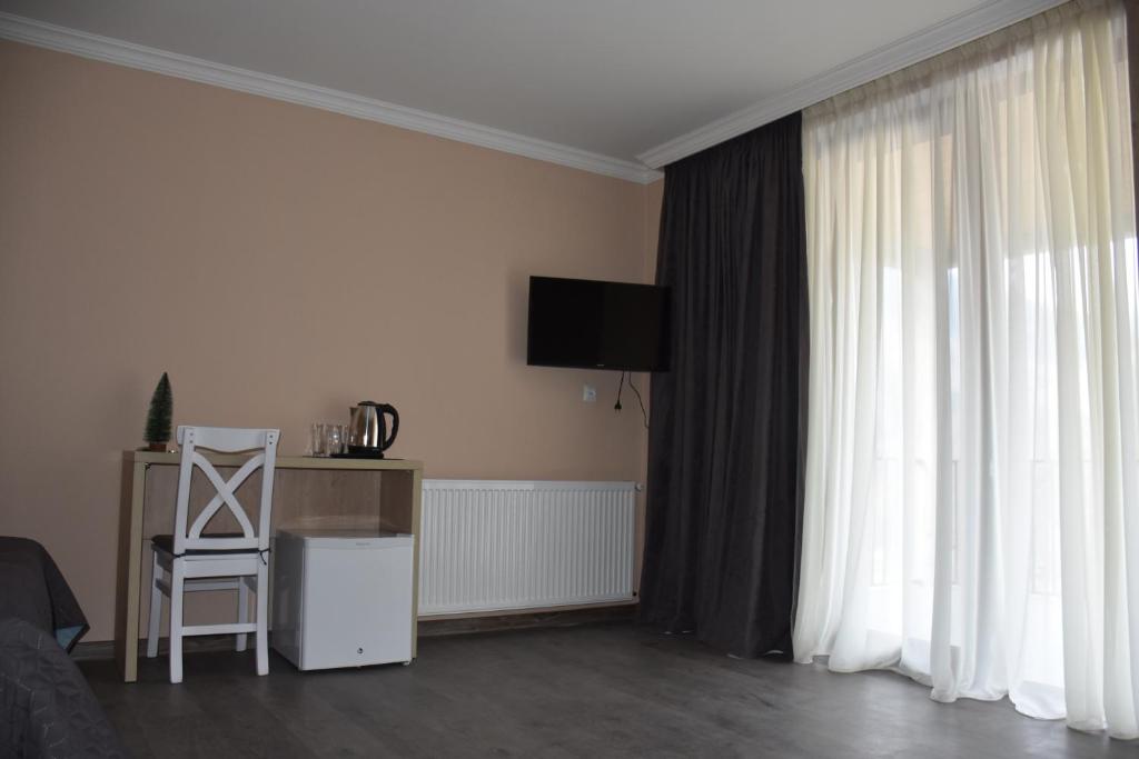 TV a/nebo společenská místnost v ubytování Nikala's house