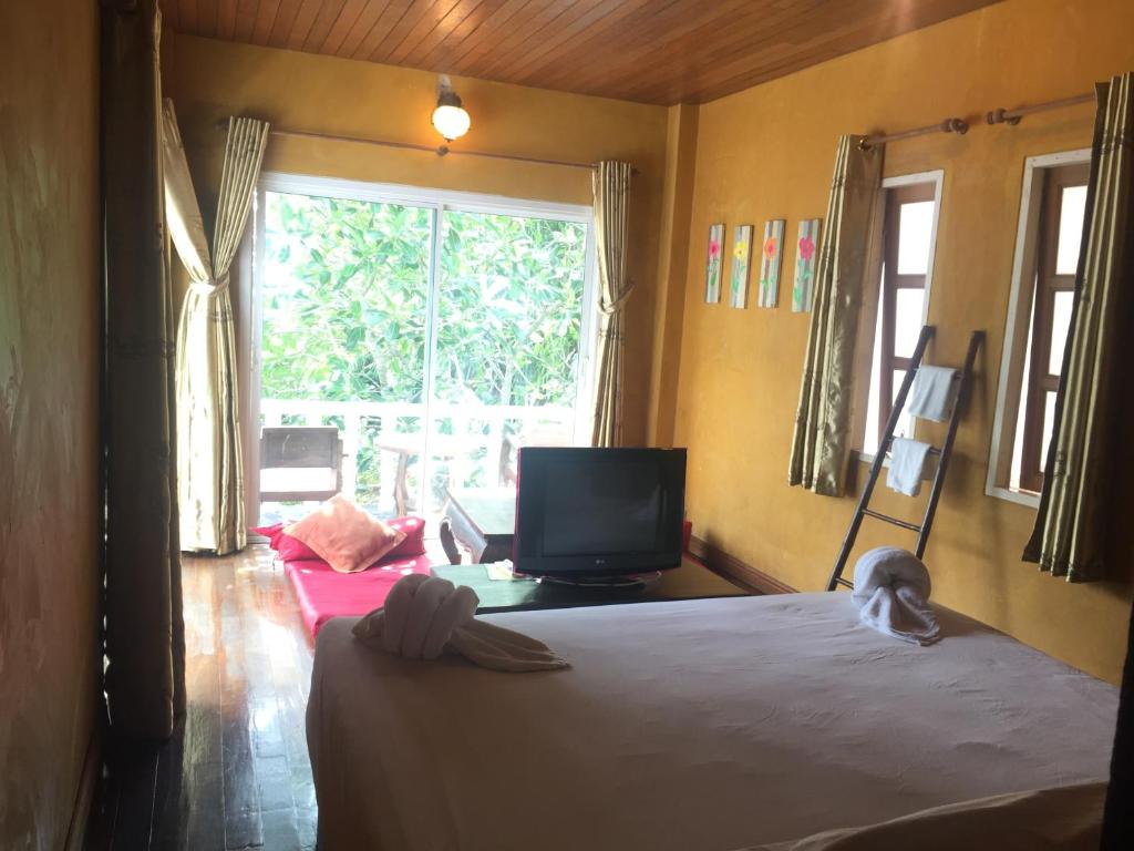 Postel nebo postele na pokoji v ubytování Keereeta Resort