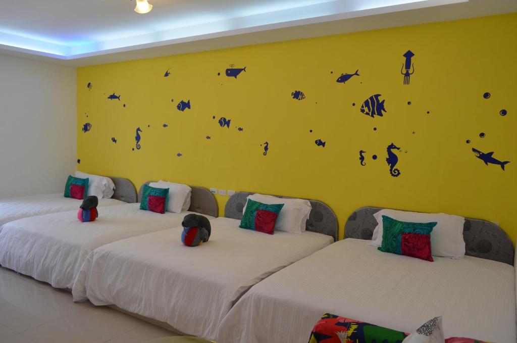 Postel nebo postele na pokoji v ubytování Nandian Homestay