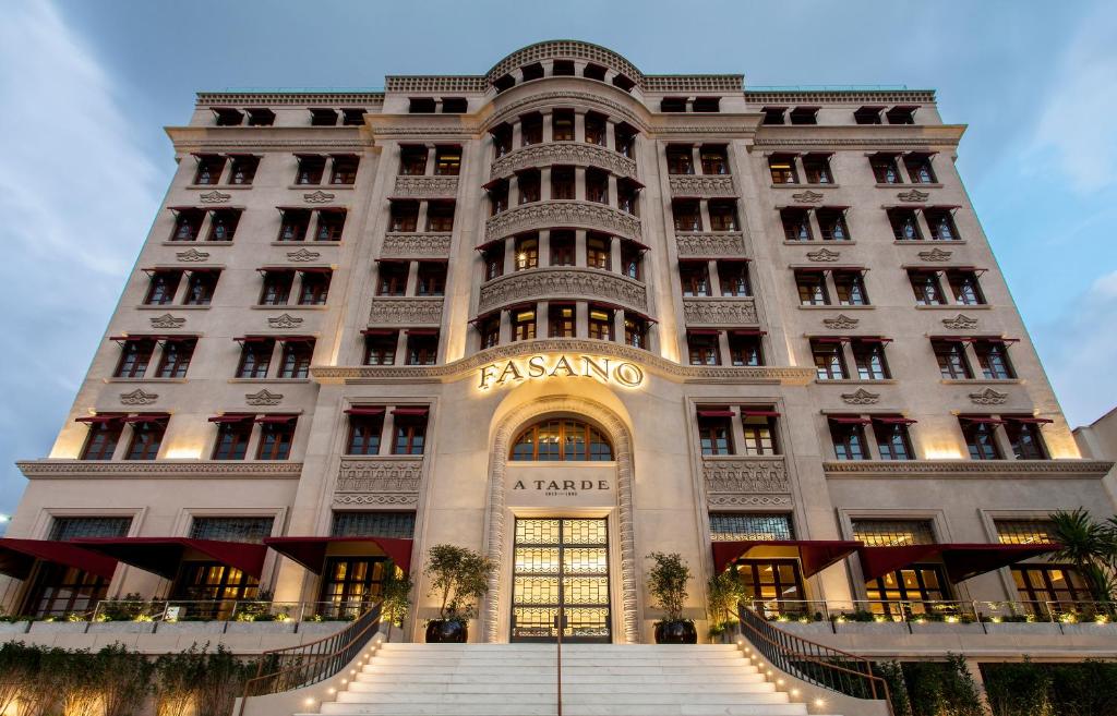 a large white building with a sign on it at Hotel Fasano Salvador in Salvador