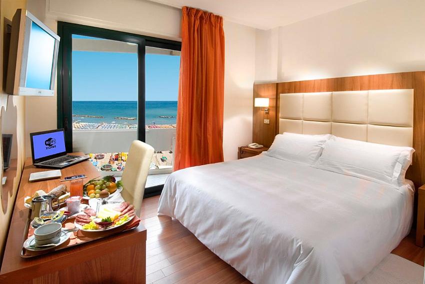 Łóżko lub łóżka w pokoju w obiekcie Park Hotel